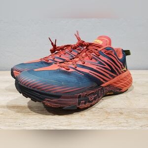 HOKA ONE ONE Men’s Speedgoat 4 Vibram Mega Grip Trail Running Shoes (9) Orange